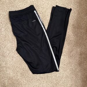 Adidas Black Joggers with Silver Stripes and Sleek Tapered Design